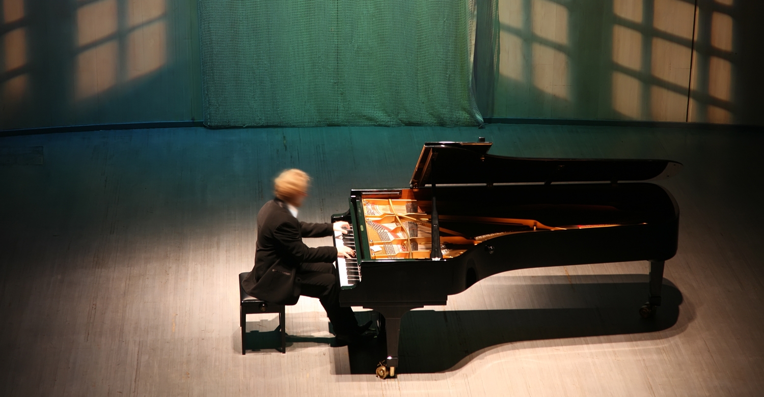 bigstock-pianist-after-piano-2446942.jpg