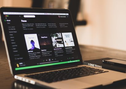 Laptop running Spotify