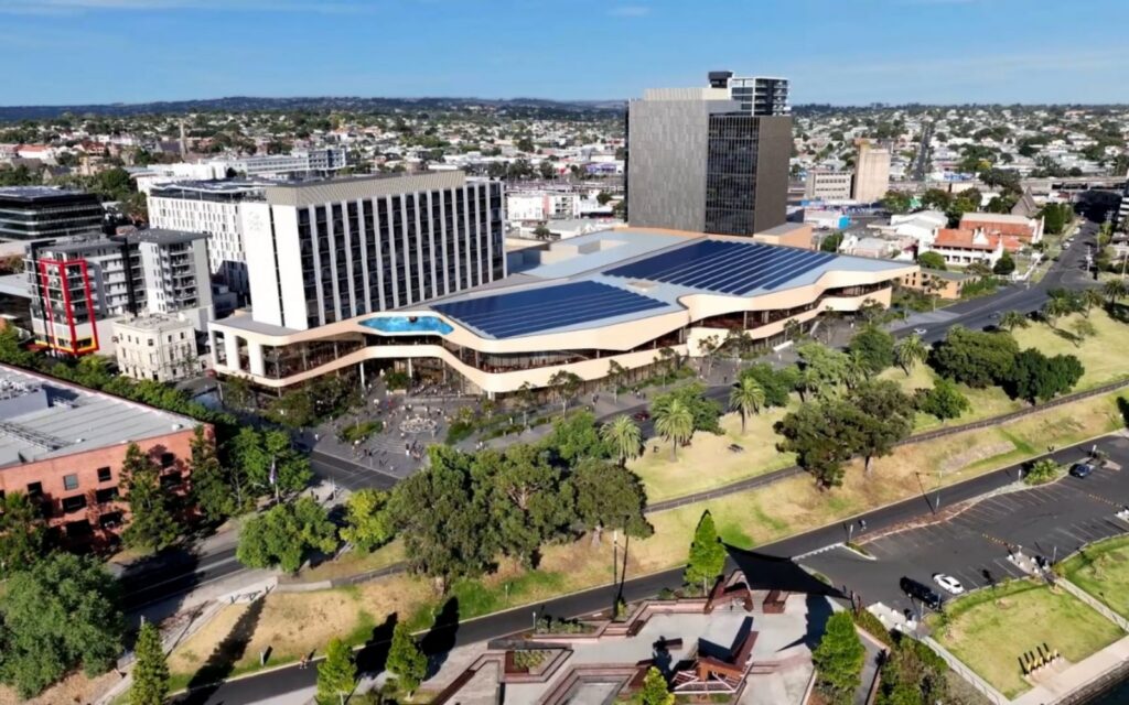 Geelong's new convention centre on blue background.