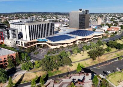 Geelong's new convention centre on blue background.