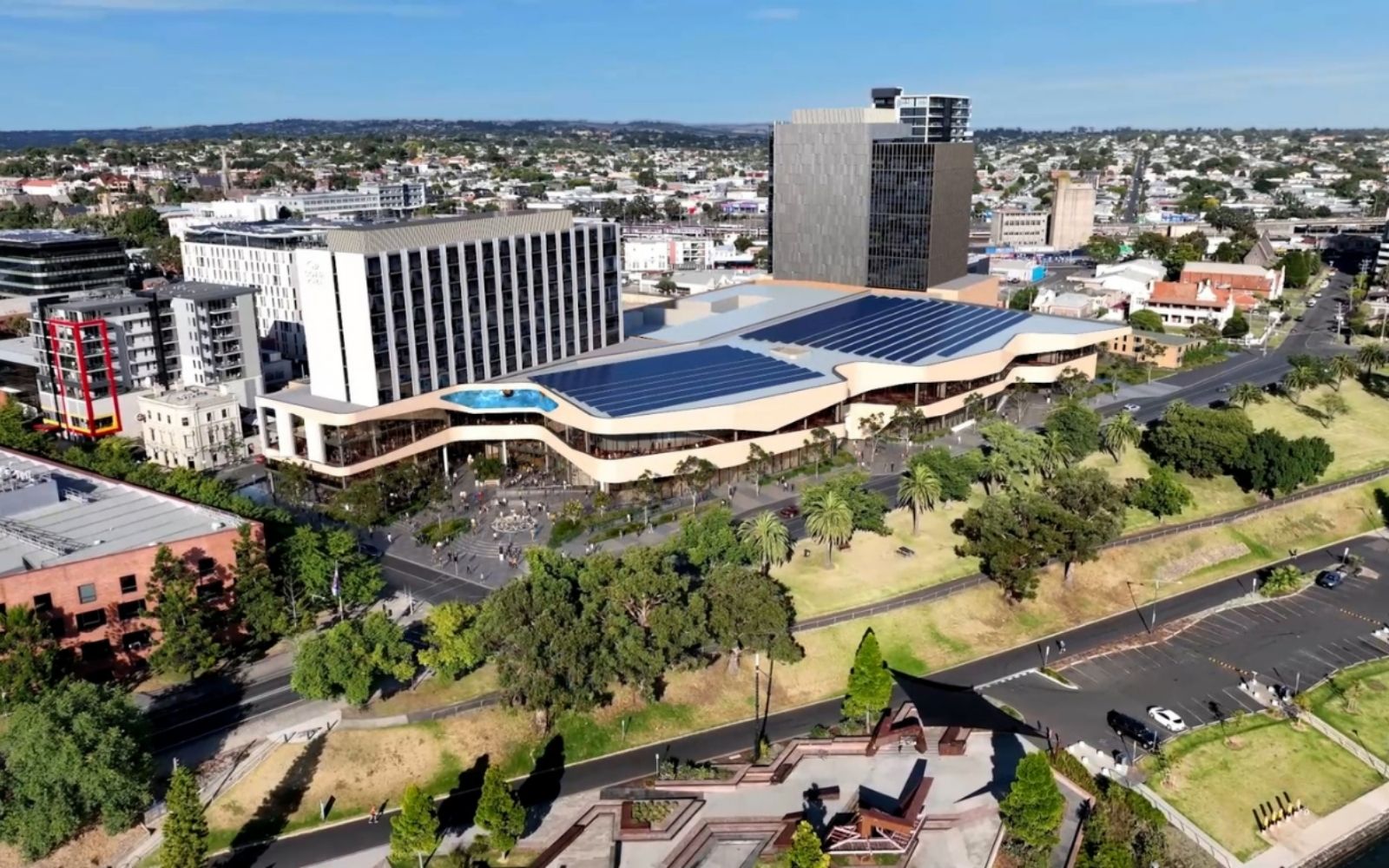 Geelong's new convention centre on blue background.