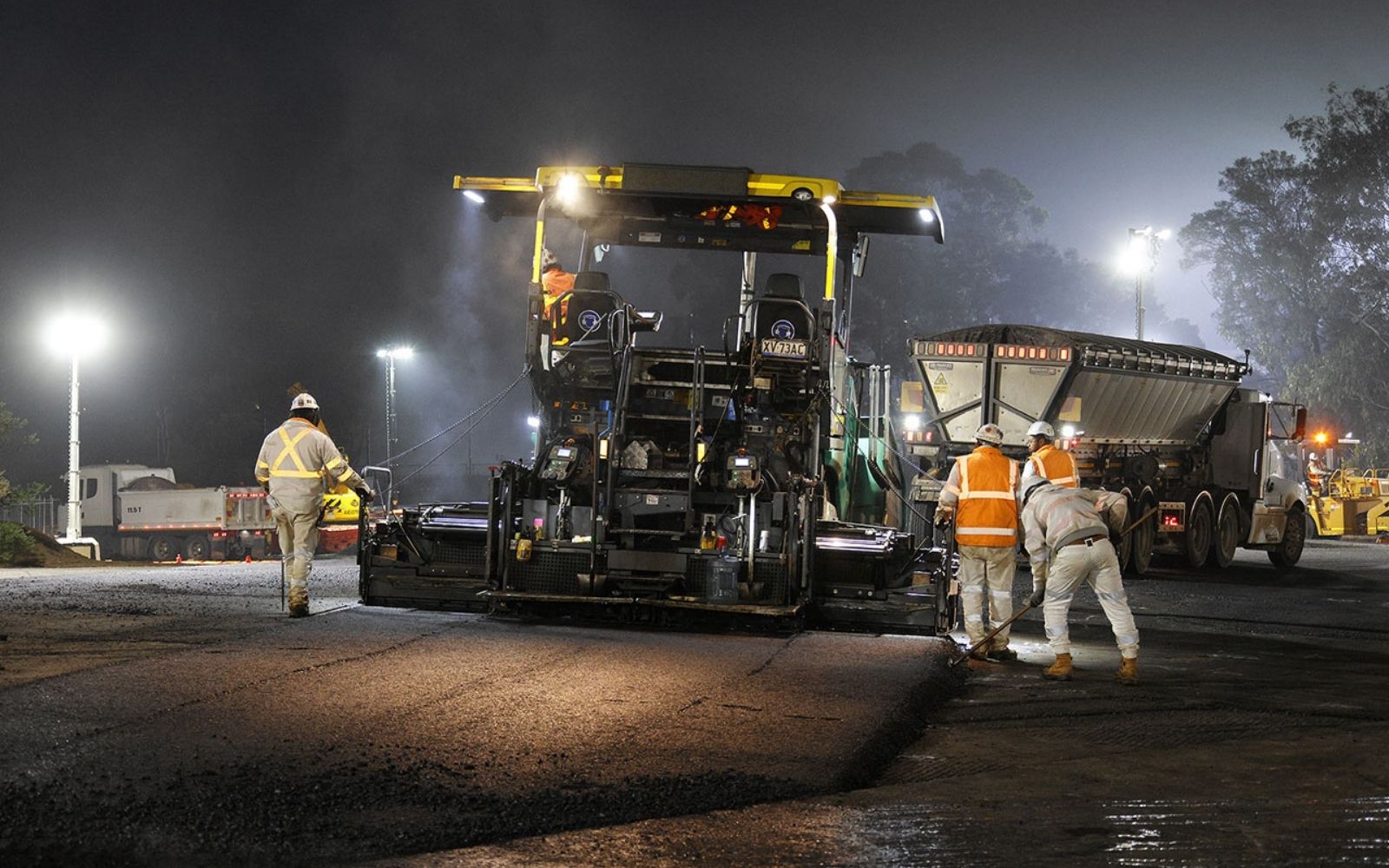 Construction crews and equipment on the Eastern Freeway in Melbourne during North East Link Project flyover lane installation works