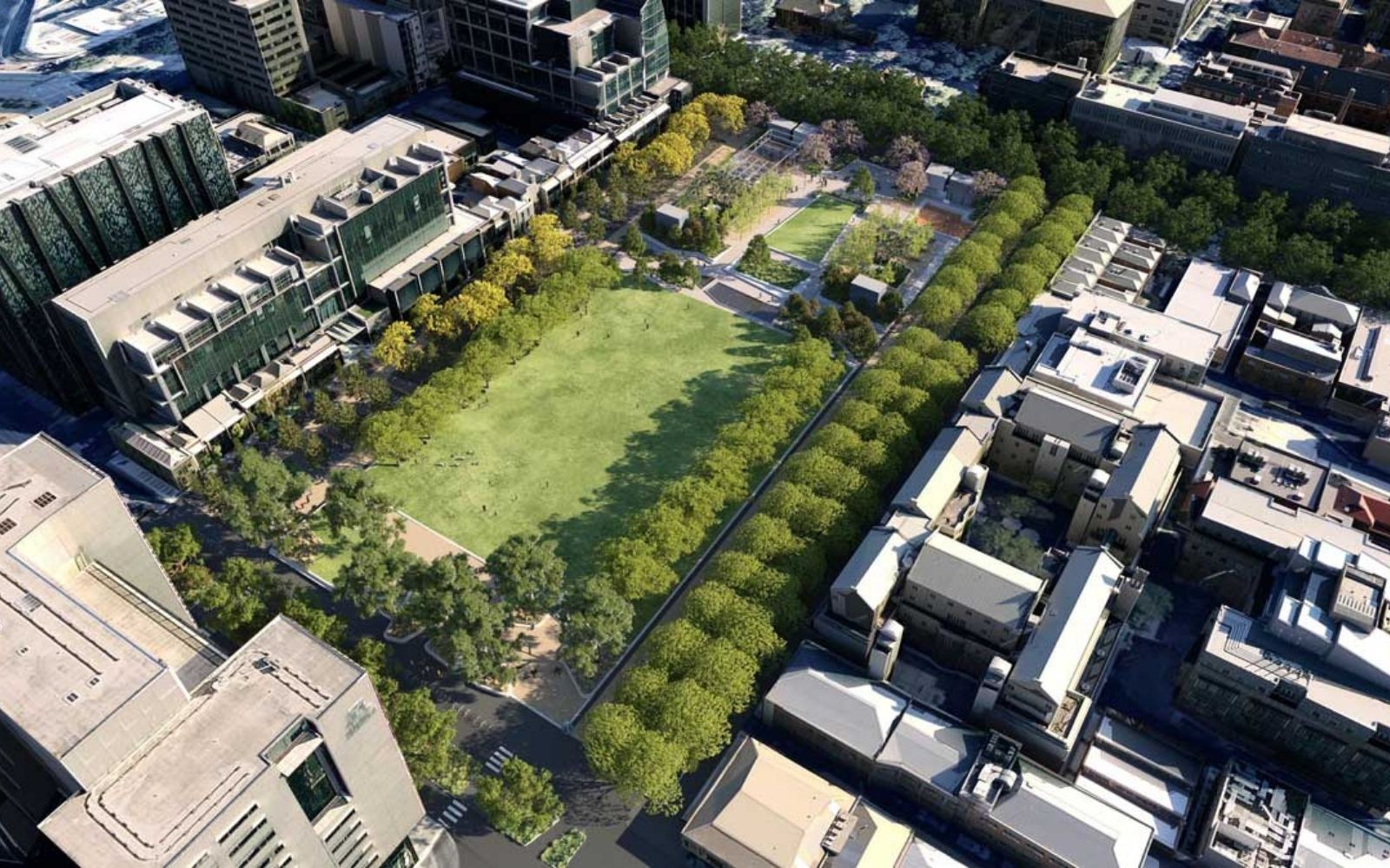Aerial render of the redeveloped University Square in Carlton, showing an expanded green lawn surrounded by mature trees and university buildings, part of the Metro Tunnel Parkville Station precinct.