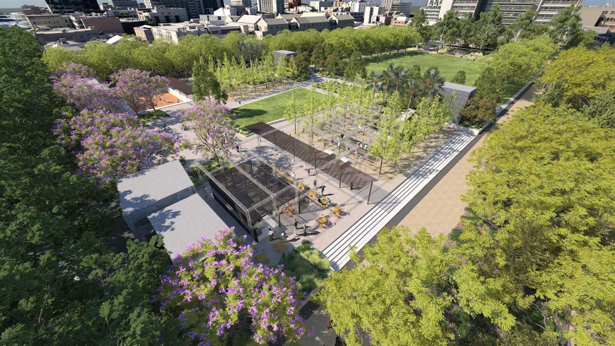 Render of the new University Square plaza featuring jacaranda trees, a covered pavilion structure and landscaped gathering spaces near the Metro Tunnel's Parkville Station.
