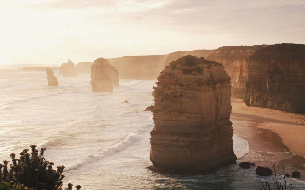 The Twelve Apostles rock stacks rising from the Southern Ocean at sunset along Victoria's Great Ocean Road