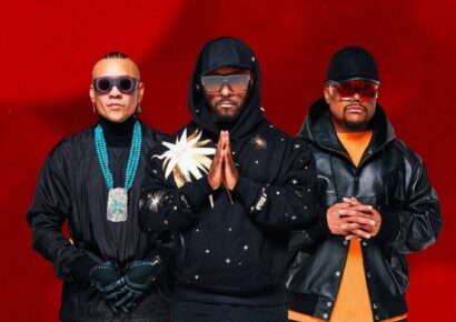 Black Eyed Peas in black against a red backdrop, leading the BTV lineup at Beyond The Valley 2026.