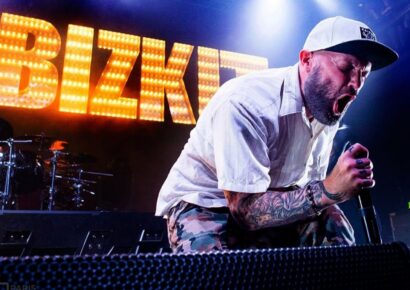 Good Things lineup headliner Limp Bizkit's Fred Durst screaming into a mic on a black background.
